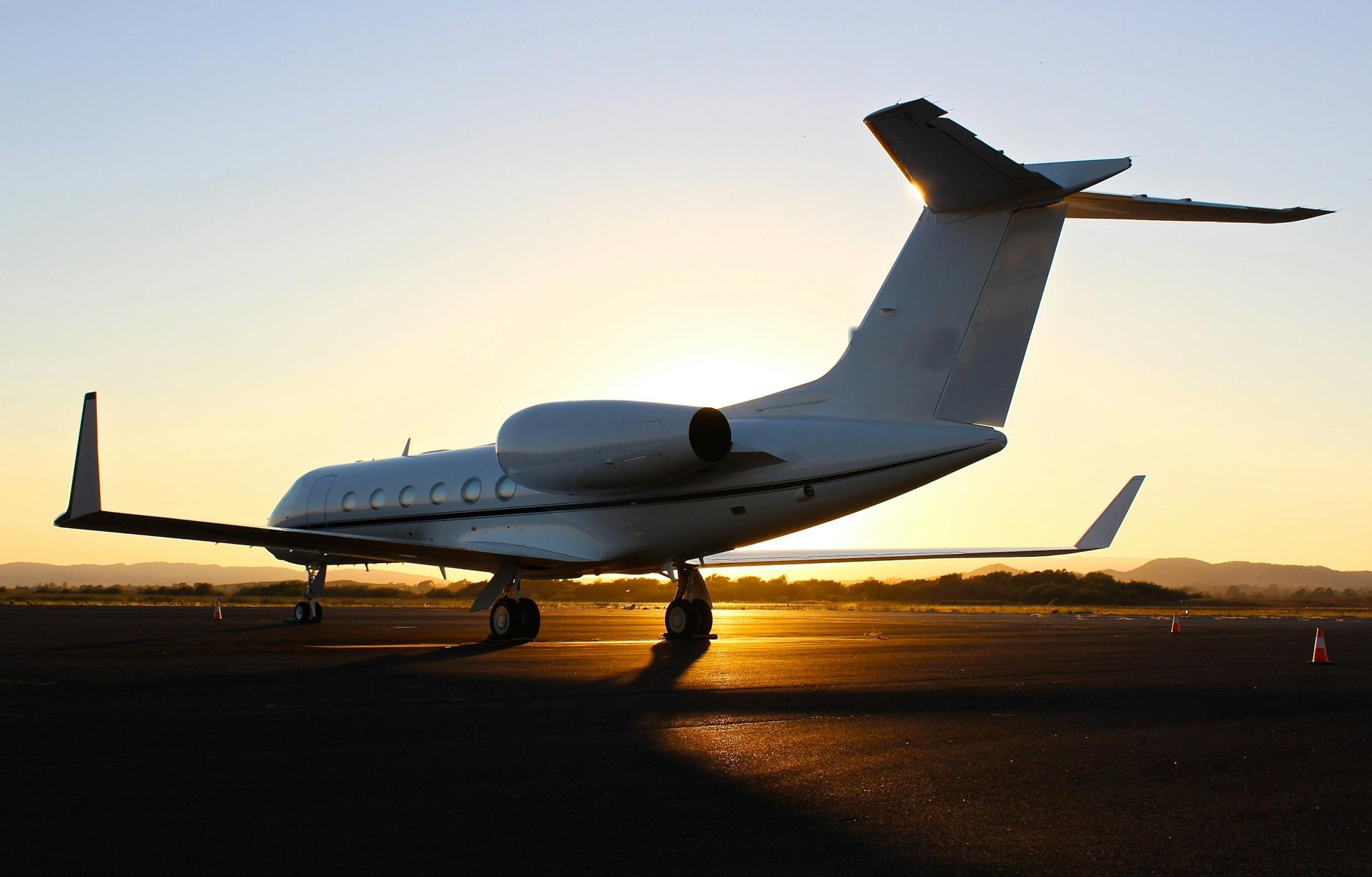 A private jet at golden hour
